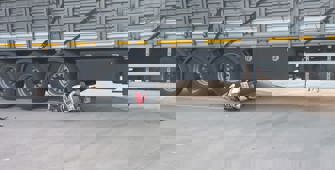 Ödemiş'te tırın altında kalan motosikletin sürücüsü yaralandı