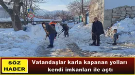 Vatandaşlar karla kapanan yolları  kendi imkanları ile açtı