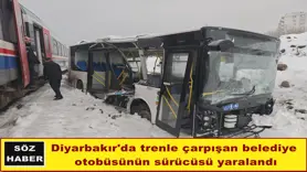 Trenle çarpışan belediye  otobüsünün sürücüsü yaralandı
